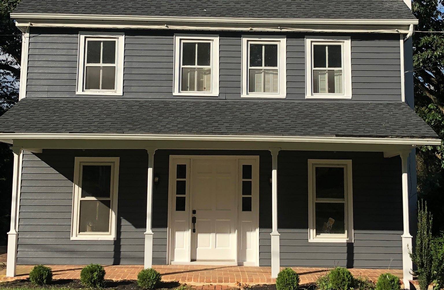 A freshly painted grey two-story home in Central PA