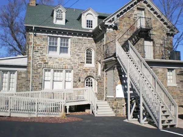 A historic stone house after exterior painting