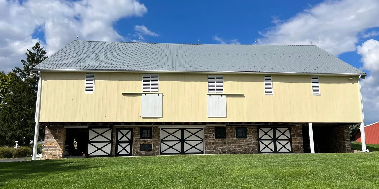 A freshly painted yellow barn in Central PA